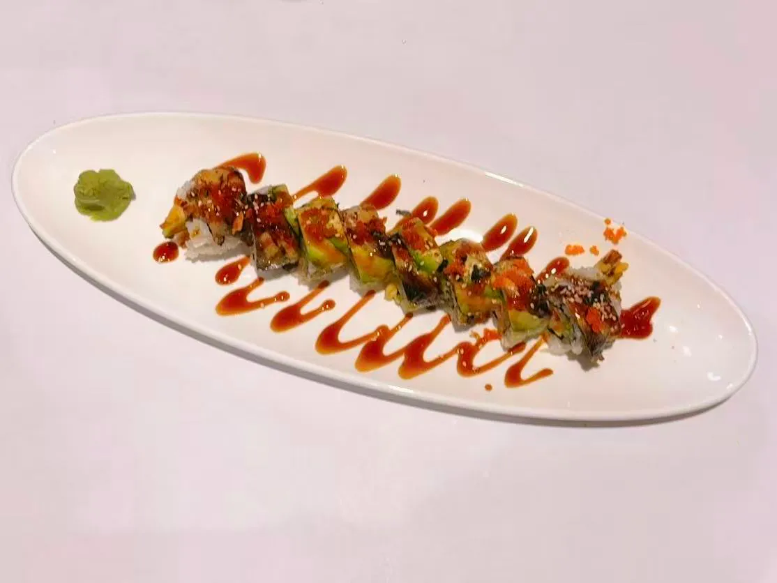 Grilled eel avocado sushi roll with sauce at Mushi Sushi & Ramen, a Japanese Restaurant in Happy Valley